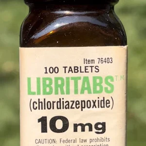 100 Librium 10 mg tablets in a sealed bottle held in hands, showcasing the packaging and quantity of the medication.