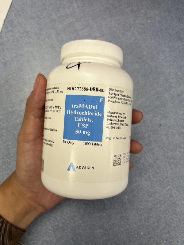 Tramadol oral tablet in a sealed container, held in hand, ready for purchase at Zylix Drugstore with secure and discreet shipping.