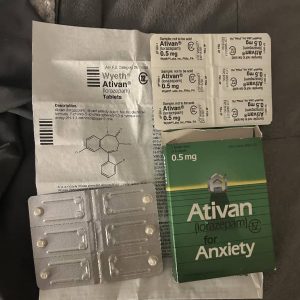 Ativan oral tablet (Lorazepam) medication packet with two tablets placed outside, offering trusted anxiety relief from Zylix Drugstore.