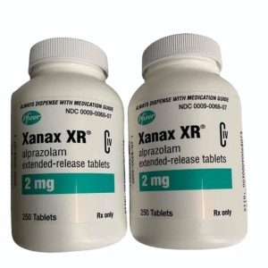 Two sealed bottles of Xanax oral tablet (Xanax XR) neatly displayed, highlighting availability for purchase without a prescription.