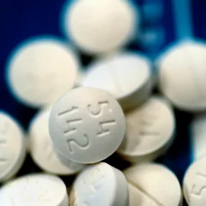 Methadone oral tablets neatly displayed on a clean surface, ready for use.