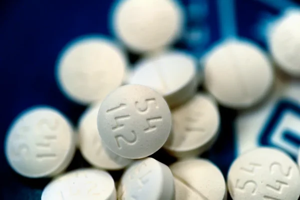 Methadone oral tablets neatly displayed on a clean surface, ready for use.