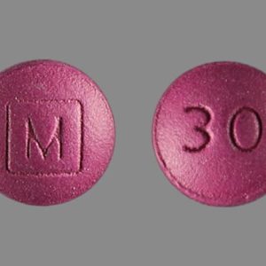 Morphine 30mg pill – front and back view showing dosage details and imprint.